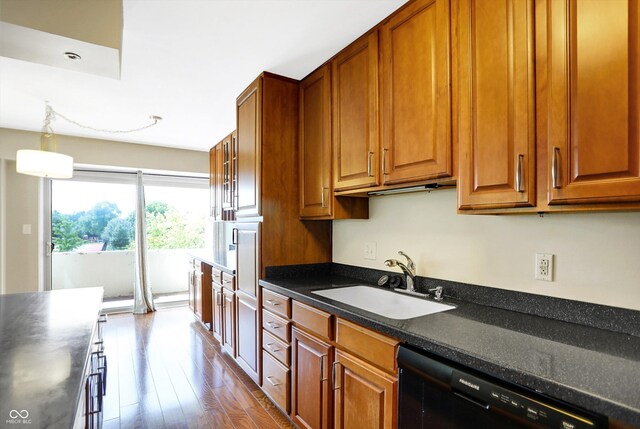 kitchen with sink, light hardwood / wood-style flooring, and dishwasher