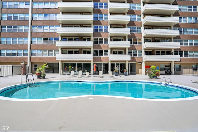 view of swimming pool featuring a patio