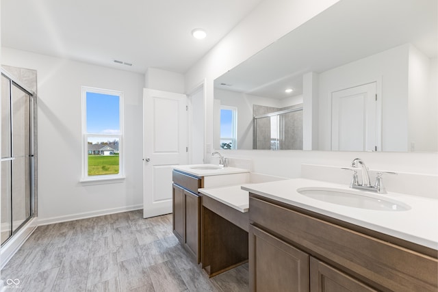 full bath with recessed lighting, a shower stall, visible vents, and vanity