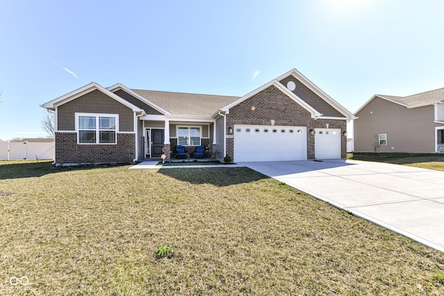 view of front of house with a garage and a front yard