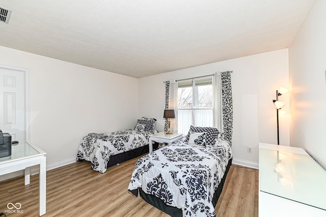 14626 Warner Trl, Westfield, IN 46074 - bedroom featuring light wood-type flooring and baseboards