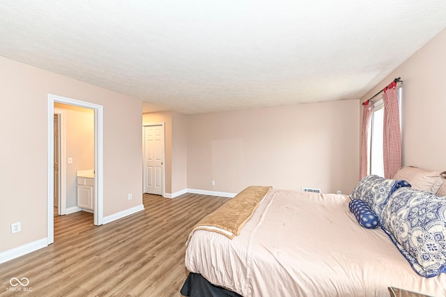 14626 Warner Trl, Westfield, IN 46074 - bedroom with light wood-style flooring and baseboards