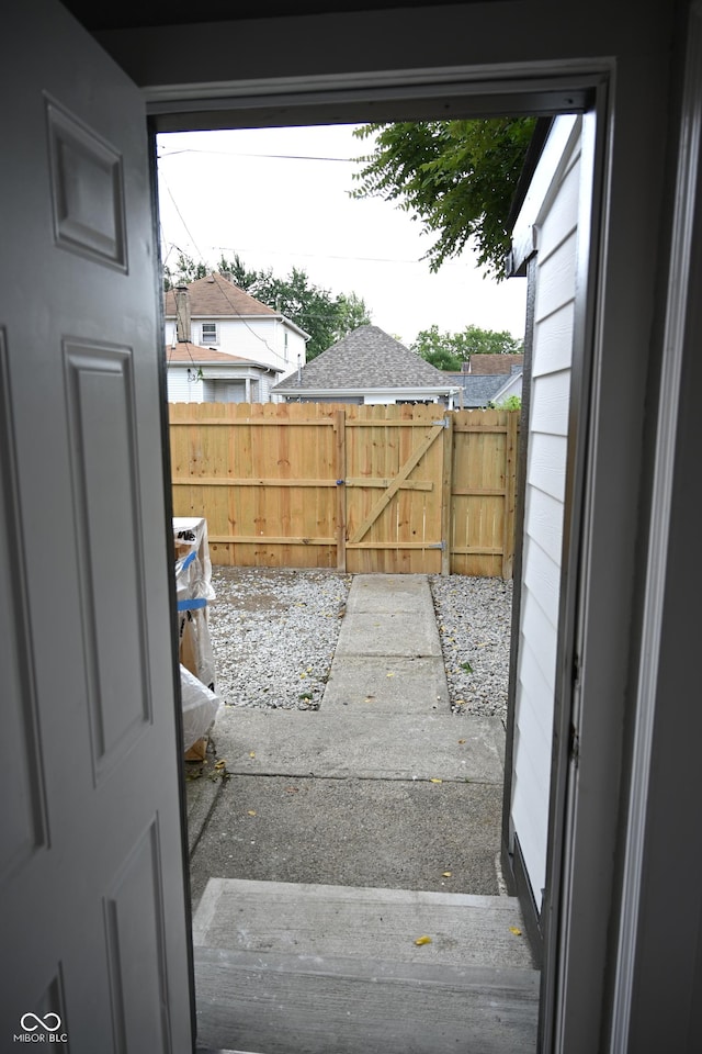 view of yard featuring a gate and fence