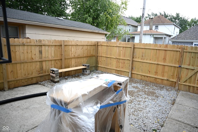 view of patio featuring fence