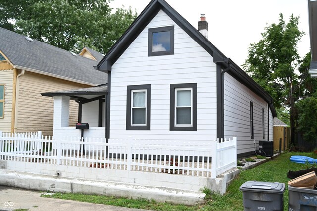 view of side of home featuring central air condition unit