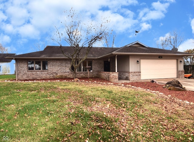 ranch-style house featuring a front yard and a garage