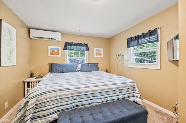 carpeted bedroom with a wall mounted AC