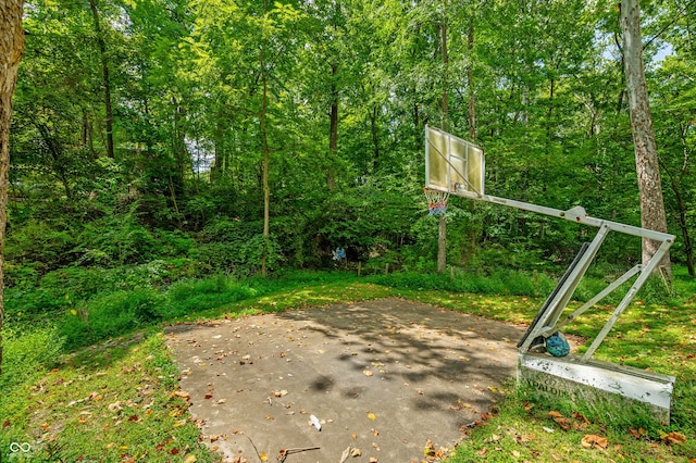 view of patio / terrace with basketball hoop