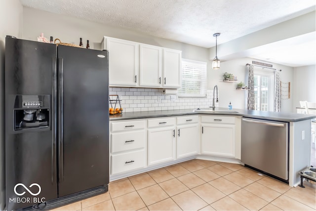 kitchen featuring black refrigerator with ice dispenser, dishwasher, decorative light fixtures, backsplash, and white cabinets