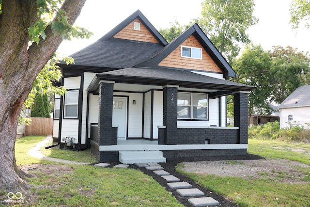 view of front of home with a front yard