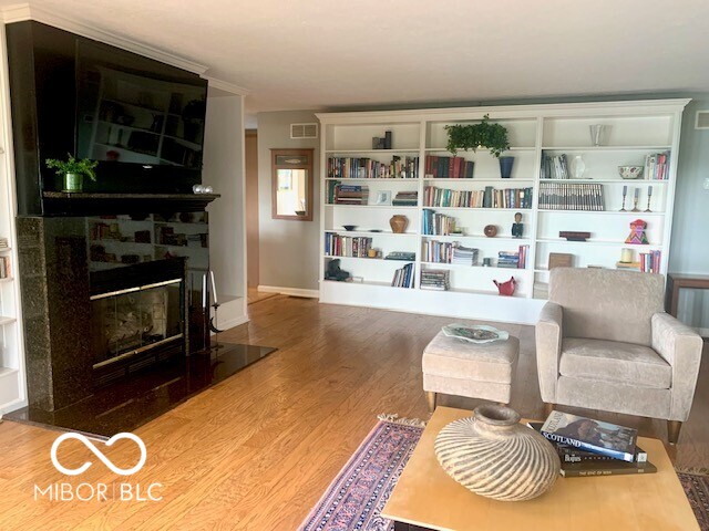 living area with wood-type flooring