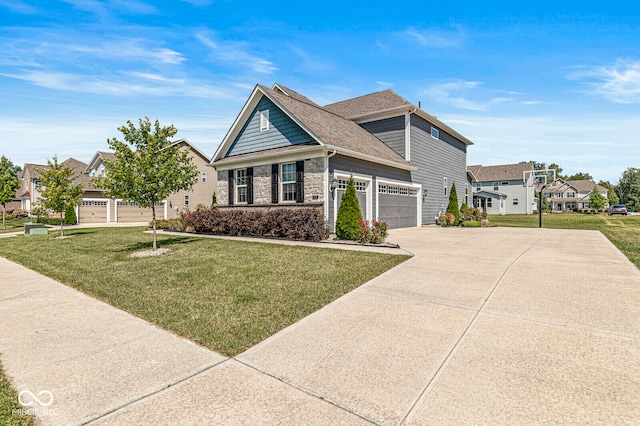 view of front of property with a garage and a front lawn