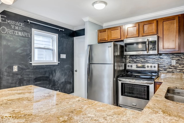 kitchen featuring appliances with stainless steel finishes, light stone counters, crown molding, and tasteful backsplash