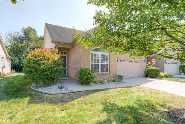 view of property hidden behind natural elements with a front yard and a garage