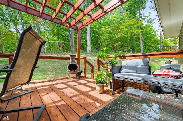 wooden terrace with a pergola