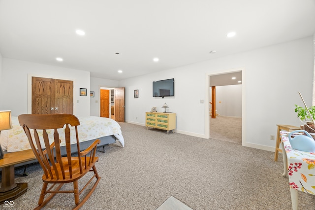 bedroom with light carpet