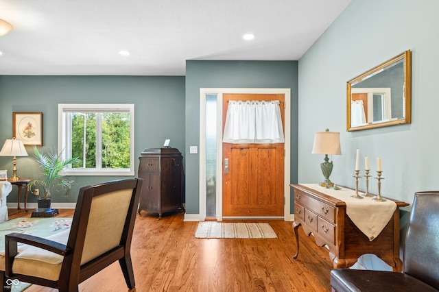 entryway with light hardwood / wood-style floors