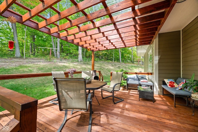 wooden terrace featuring an outdoor living space and a pergola