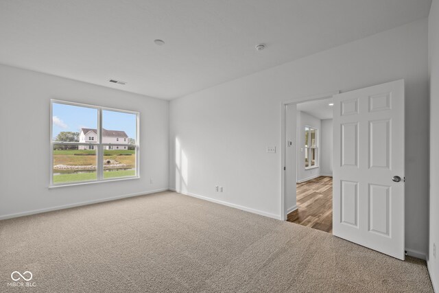 empty room featuring carpet