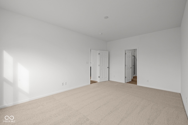 empty room featuring carpet flooring