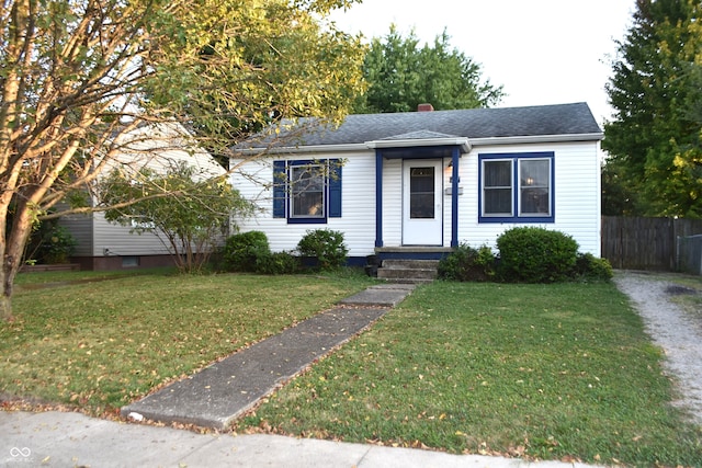 bungalow with a front lawn