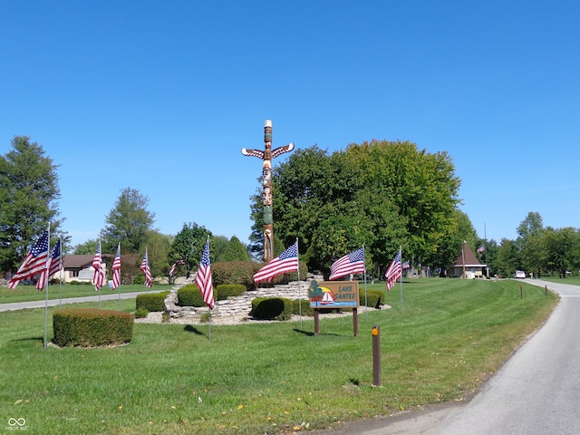 view of community featuring a lawn