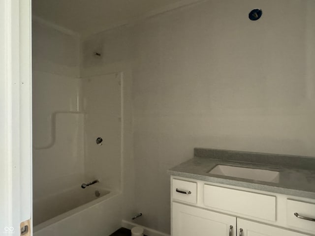 bathroom featuring vanity and bathing tub / shower combination