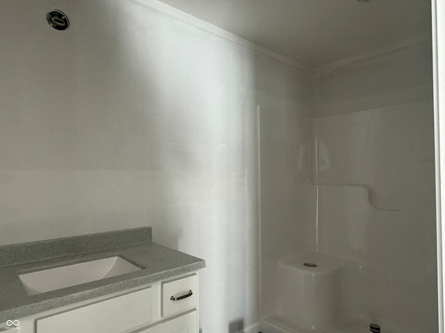 bathroom featuring vanity and walk in shower