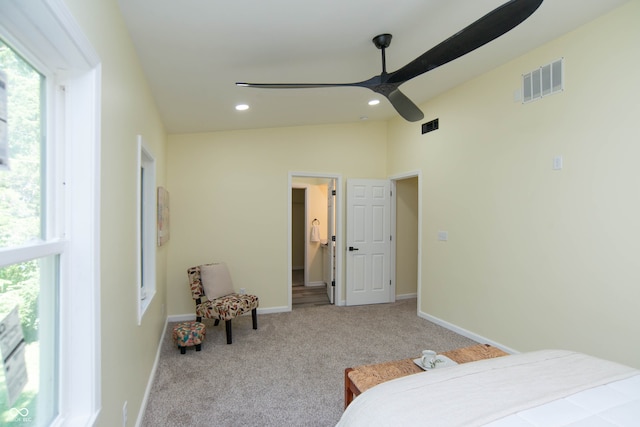 carpeted bedroom featuring ceiling fan and lofted ceiling