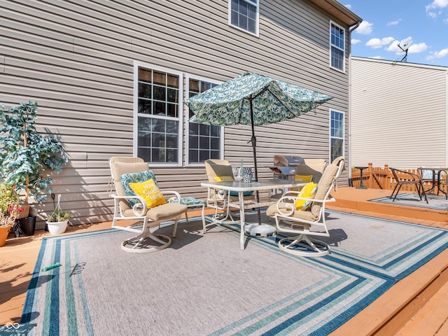 view of patio / terrace featuring a wooden deck