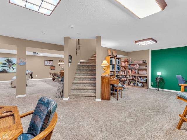 interior space with pool table and a textured ceiling