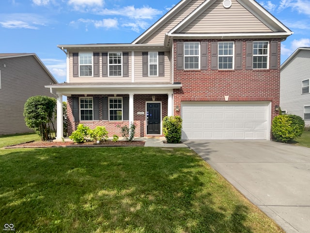 view of front of property featuring a garage and a front lawn