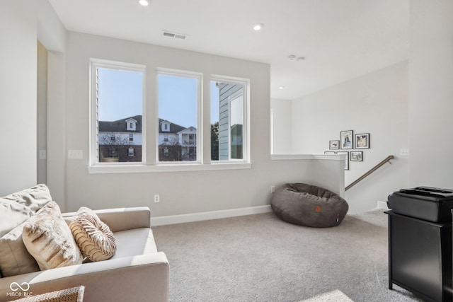 living area with carpet floors