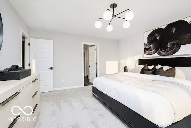 carpeted bedroom featuring a chandelier