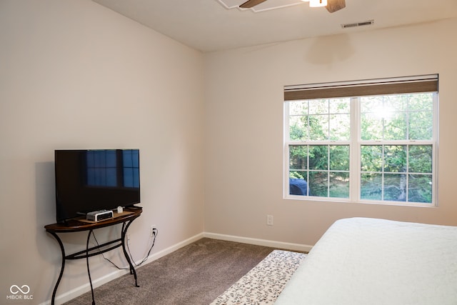 carpeted bedroom with ceiling fan