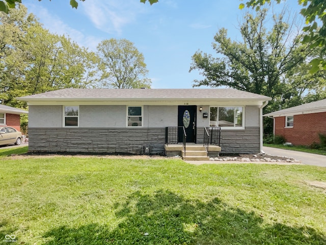 4013 N Graham Ave, Indianapolis, IN 46226 - view of front of property with stone siding and a front lawn