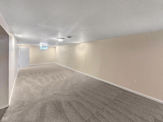 4013 N Graham Ave, Indianapolis, IN 46226 - empty room featuring carpet flooring and baseboards