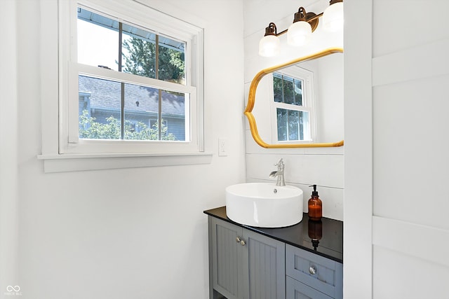 bathroom with a wealth of natural light and vanity