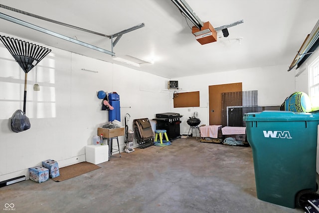 garage featuring a garage door opener