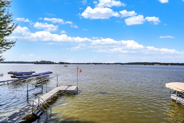 dock area with a water view