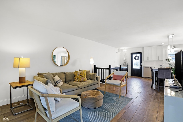 living room with dark hardwood / wood-style floors