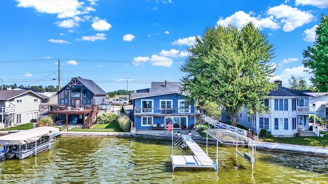 dock area featuring a deck with water view