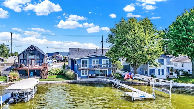 view of dock with a deck with water view