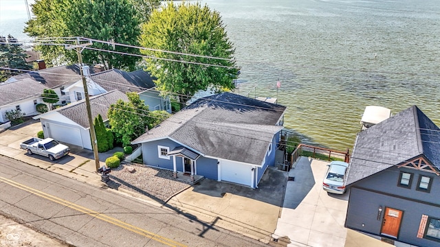 drone / aerial view featuring a water view