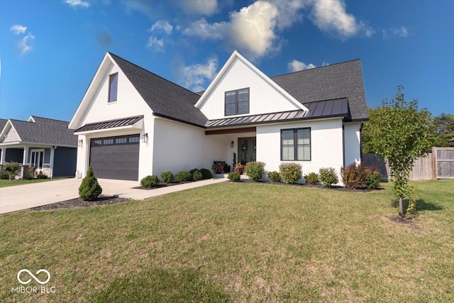 modern inspired farmhouse with driveway, metal roof, a standing seam roof, a front lawn, and brick siding