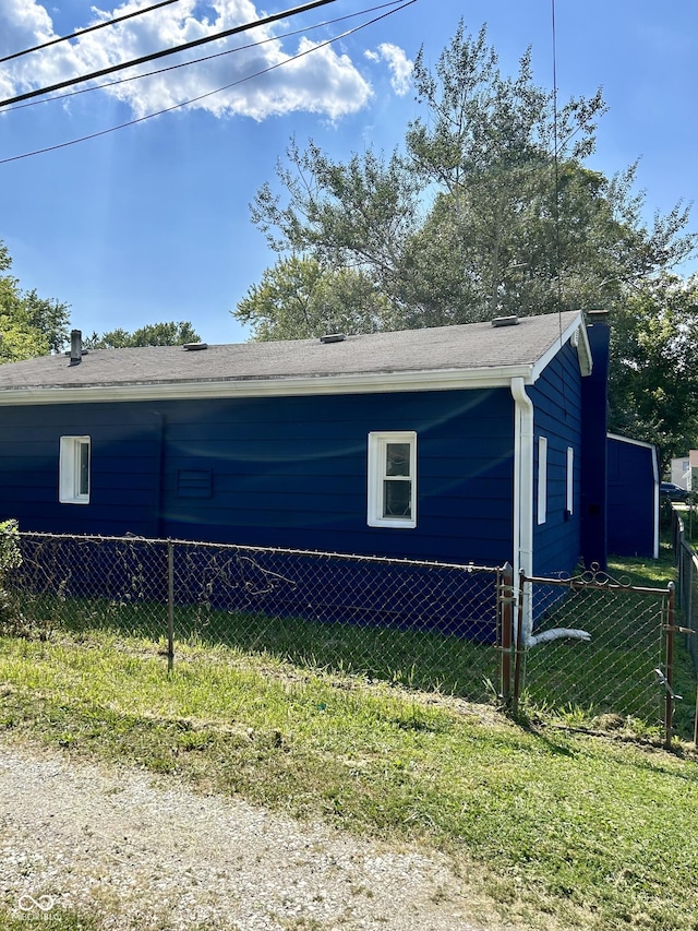 view of property exterior with fence