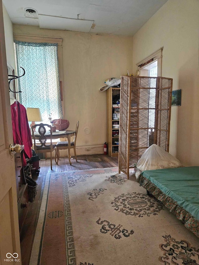 bedroom featuring hardwood / wood-style flooring