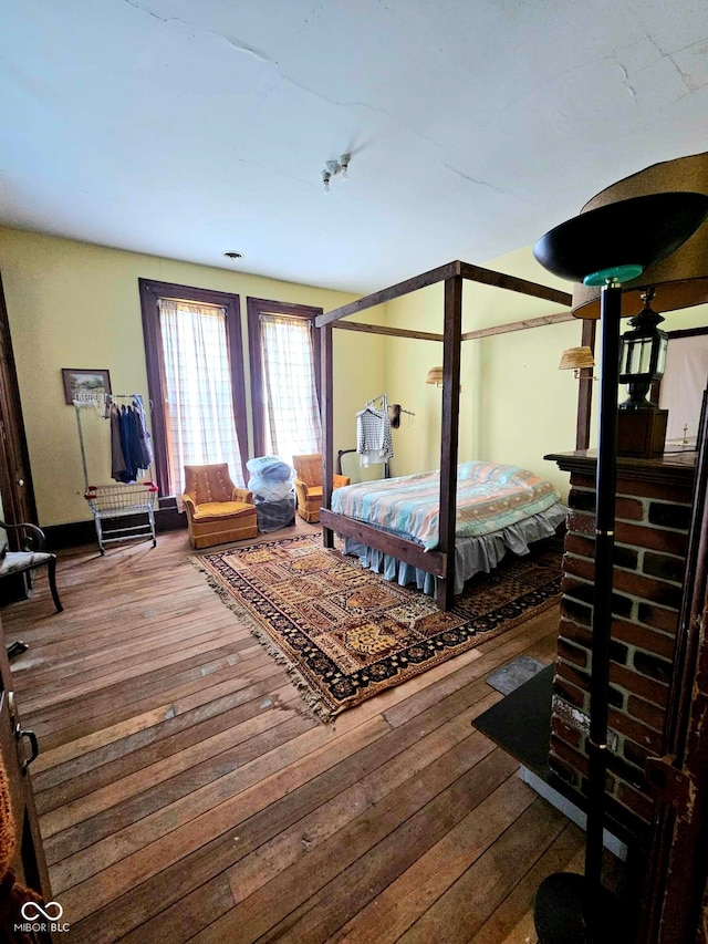 bedroom featuring hardwood / wood-style floors