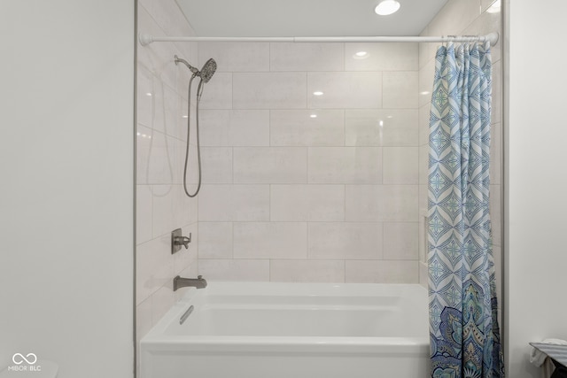 bathroom with shower / tub combo