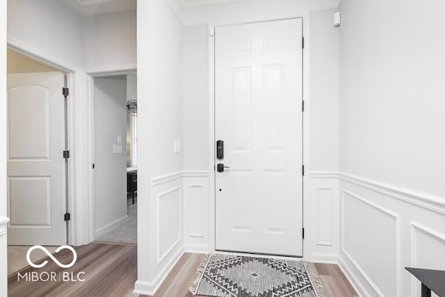 foyer with light hardwood / wood-style floors